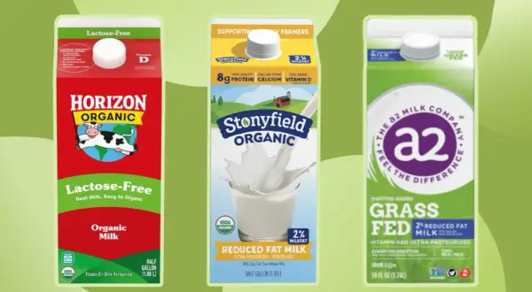Trzy kartony mleka krowiego: Horizon Organic Lactose-Free, Stonyfield Organic Reduced Fat i a2 Milk Company Grass Fed.